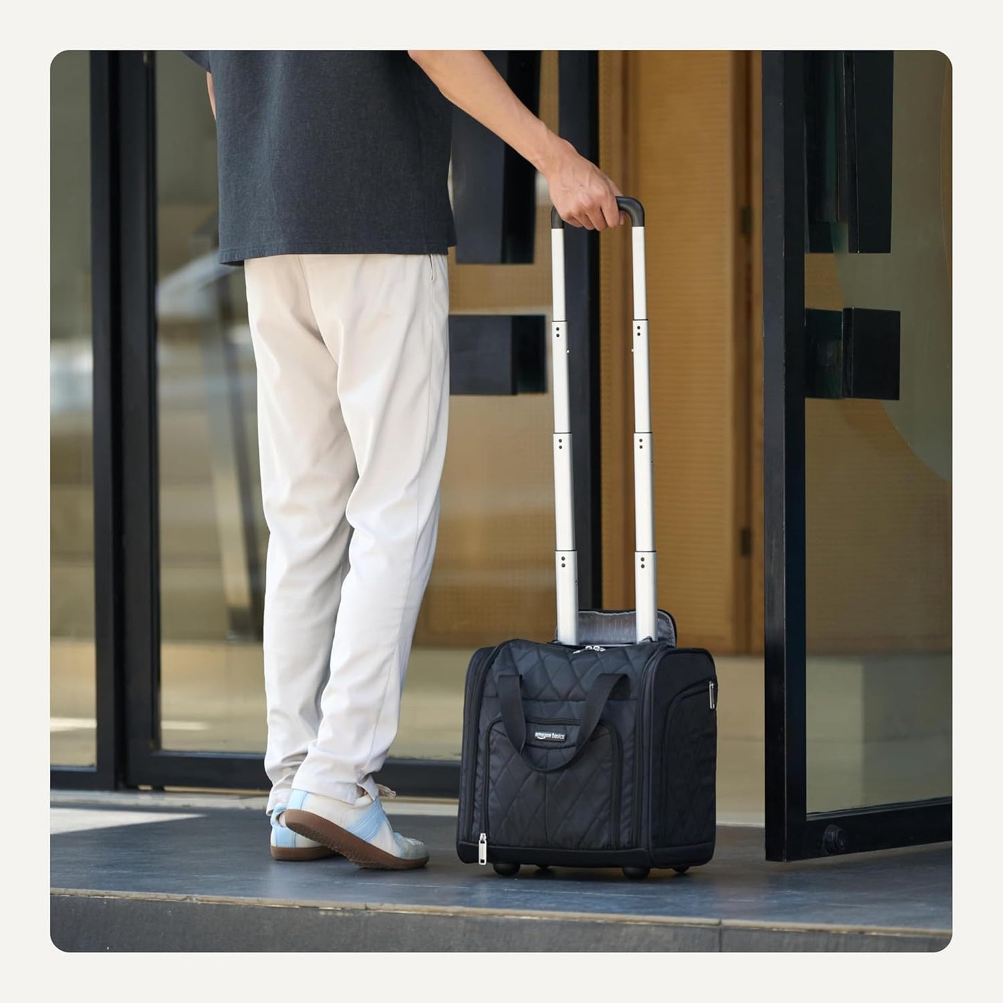 Amazon Basics Underseat Carry On Luggage with Wheels - 14" Rolling Travel Bag, Black Quilted