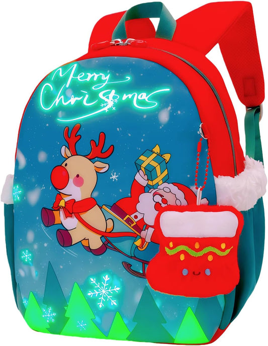 SUN EIGHT Kids Christmas Backpack – Glow in the Dark Santa & Reindeer Design, Lightweight Waterproof School Bag with Plush Stocking Charm & Gift Bag – Perfect Holiday Present for Boys and Girls